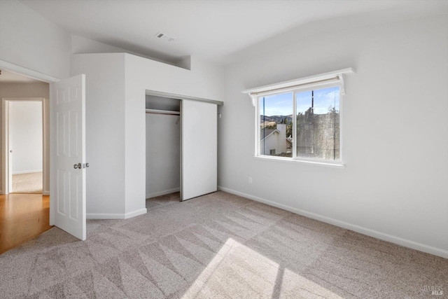 766 Calico Trl, Vacaville, CA 95687 - unfurnished bedroom featuring carpet flooring, a closet, and vaulted ceiling
