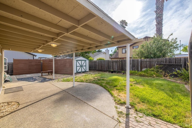 766 Calico Trl, Vacaville, CA 95687 - fenced backyard with a patio area and a storage unit
