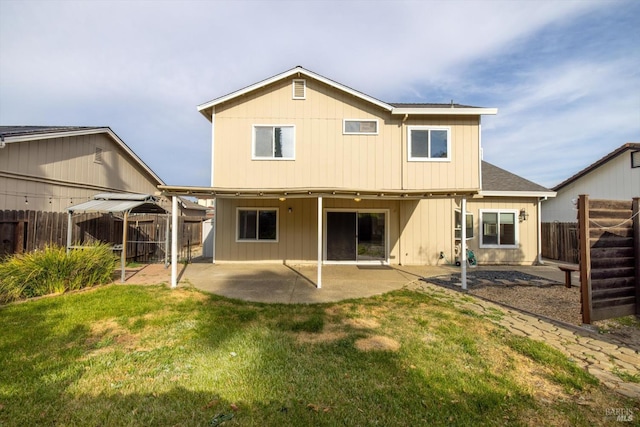 766 Calico Trl, Vacaville, CA 95687 - rear view of house with a fenced backyard and a patio