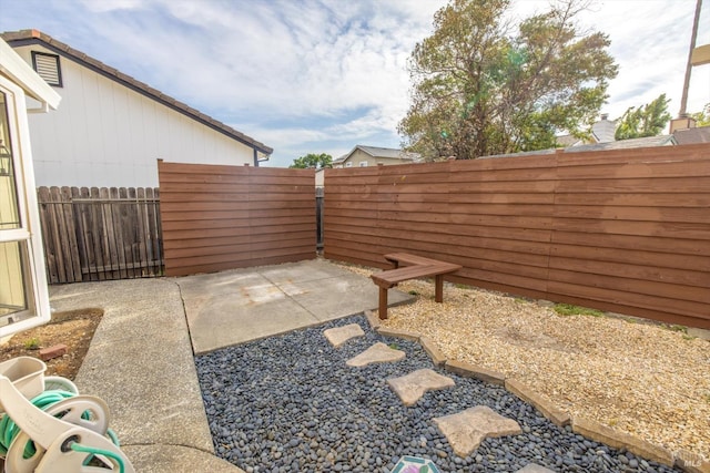 766 Calico Trl, Vacaville, CA 95687 - fenced backyard featuring a patio area and a gate