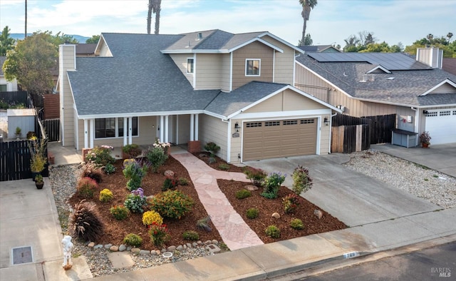 766 Calico Trl, Vacaville, CA 95687 - traditional-style home with covered porch, a garage, a shingled roof, driveway, and a chimney