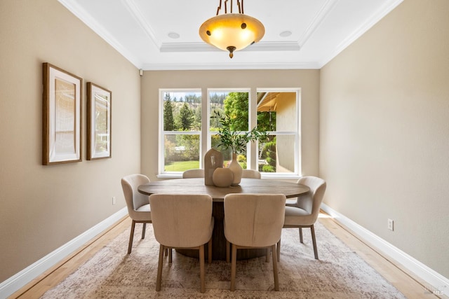 3439 Selene Ct, Santa Rosa, CA 95404 - dining room featuring light wood-style floors, a raised ceiling, and crown molding
