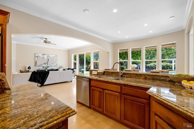 3439 Selene Ct, Santa Rosa, CA 95404 - kitchen with dishwasher, light wood-style flooring, arched walkways, crown molding, and recessed lighting