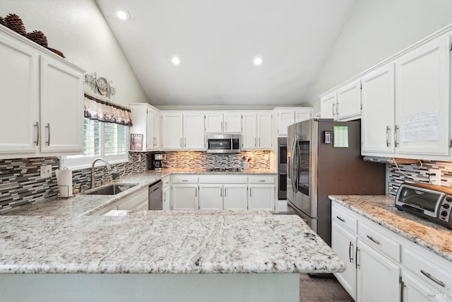 1105 Coulter Ct, Fairfield, CA 94533 - kitchen with stainless steel appliances, backsplash, white cabinets, recessed lighting, and light stone counters