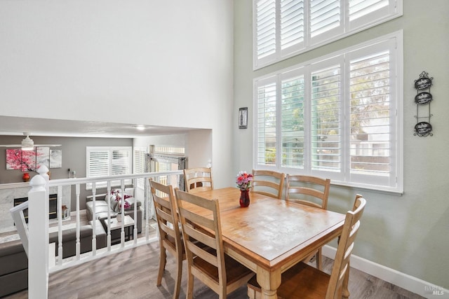 1105 Coulter Ct, Fairfield, CA 94533 - dining area with a towering ceiling and wood finished floors