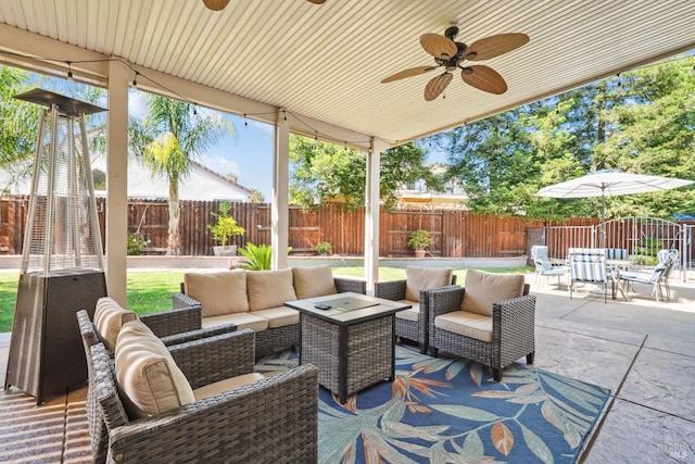 1105 Coulter Ct, Fairfield, CA 94533 - fenced backyard with an outdoor living space, outdoor dining area, a ceiling fan, and a patio area