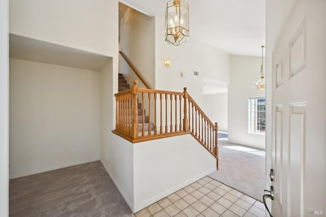 1908 Alpine Ct, Petaluma, CA 94954 - carpeted foyer featuring a chandelier, stairway, and a high ceiling