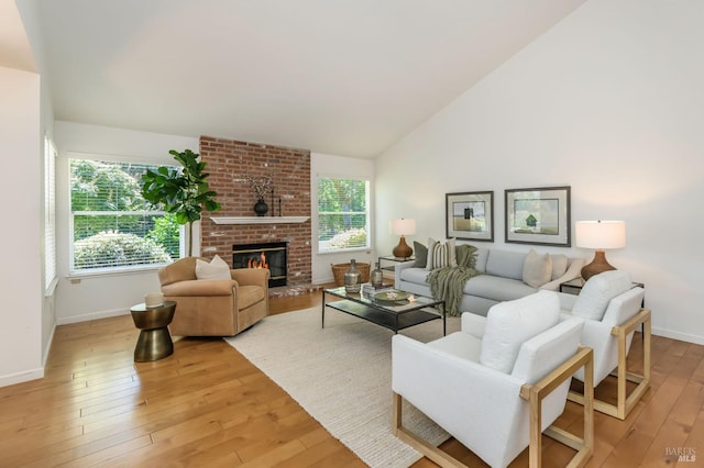 378 Miramonte Pl, Santa Rosa, CA 95409 - living area with light wood-style flooring, a fireplace, and high vaulted ceiling