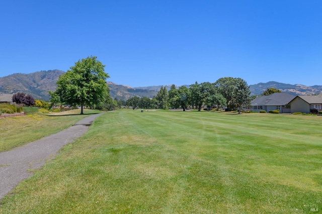 378 Miramonte Pl, Santa Rosa, CA 95409 - surrounding community with a mountain view and a lawn
