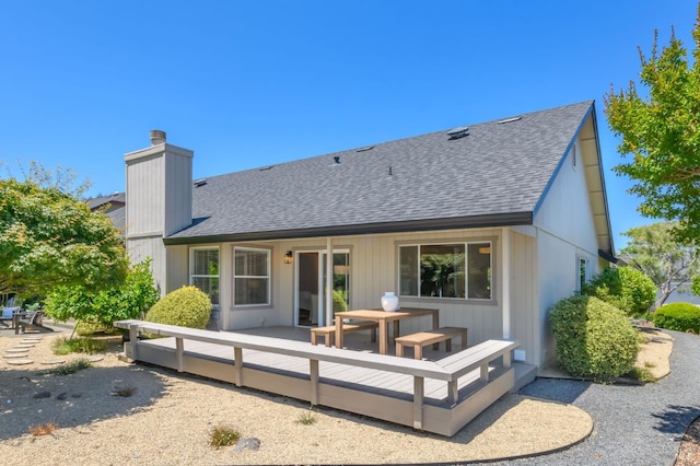 378 Miramonte Pl, Santa Rosa, CA 95409 - rear view of property featuring a shingled roof, a wooden deck, and a chimney