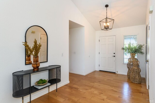 378 Miramonte Pl, Santa Rosa, CA 95409 - foyer with light wood-style floors, a chandelier, and lofted ceiling