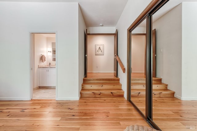 616 Wild Oak Dr, Santa Rosa, CA 95409 - hall featuring light wood-style floors and stairway
