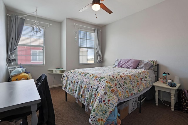1756 Camino Real Way, Roseville, CA 95747 - bedroom with carpet flooring, multiple windows, a chandelier, and a ceiling fan