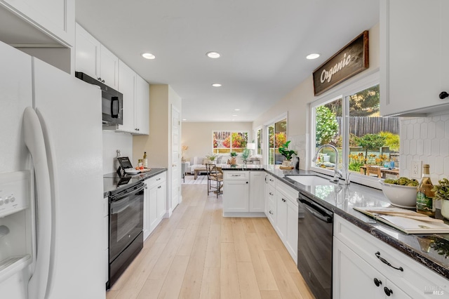 510 Hastings Dr, Benicia, CA 94510 - kitchen featuring black appliances, recessed lighting, open floor plan, white cabinetry, and light wood-type flooring