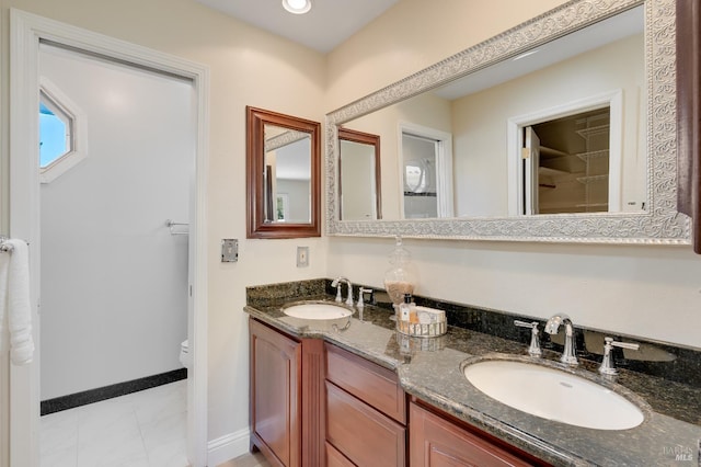 510 Hastings Dr, Benicia, CA 94510 - bathroom featuring double vanity and toilet