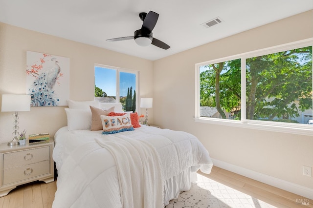 510 Hastings Dr, Benicia, CA 94510 - bedroom with light wood finished floors and a ceiling fan