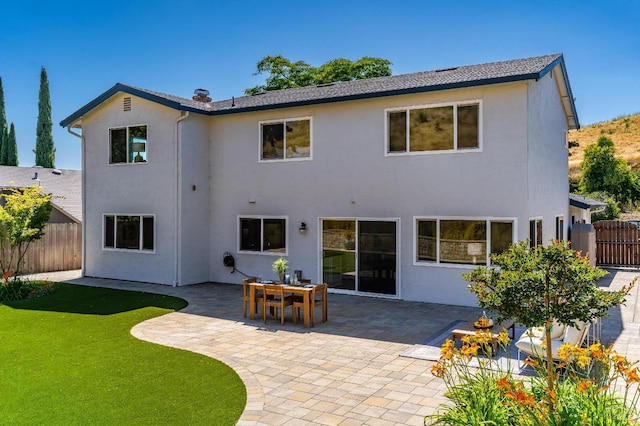 510 Hastings Dr, Benicia, CA 94510 - back of house featuring stucco siding and a patio