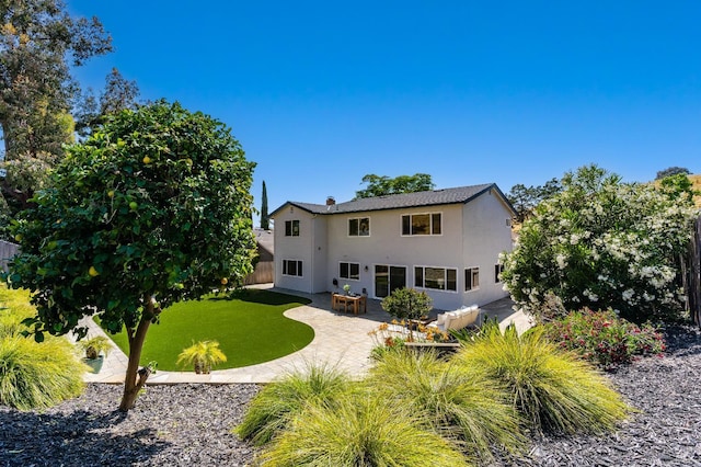 510 Hastings Dr, Benicia, CA 94510 - rear view of property featuring stucco siding and a patio