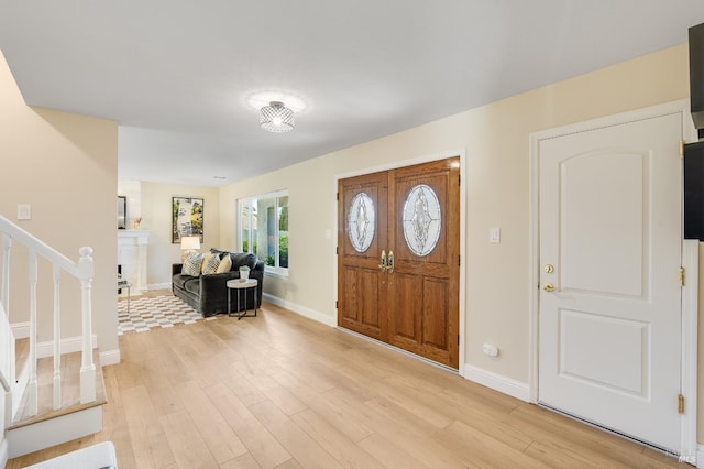 510 Hastings Dr, Benicia, CA 94510 - entryway featuring light wood-type flooring and stairs
