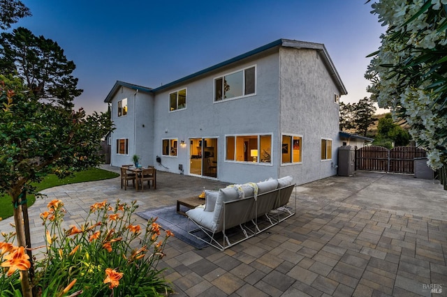 510 Hastings Dr, Benicia, CA 94510 - rear view of property featuring a gate, a patio area, and stucco siding