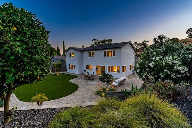 510 Hastings Dr, Benicia, CA 94510 - rear view of house featuring stucco siding and a patio area