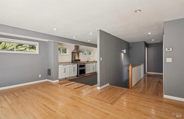 31 Buckelew St, Sausalito, CA 94965 - unfurnished living room featuring light wood-style flooring and recessed lighting