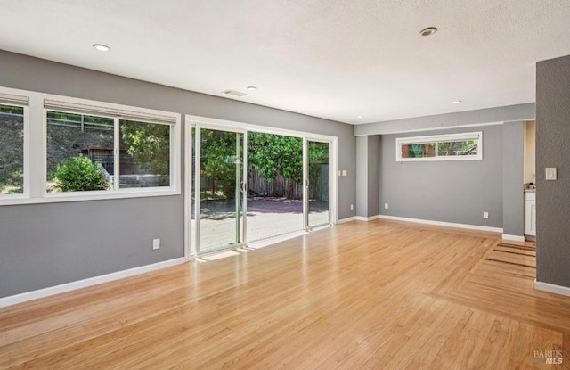 31 Buckelew St, Sausalito, CA 94965 - unfurnished room with healthy amount of natural light, light wood-style floors, and recessed lighting