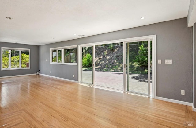 31 Buckelew St, Sausalito, CA 94965 - unfurnished room with light wood-type flooring, recessed lighting, and a textured wall