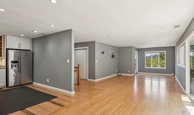 31 Buckelew St, Sausalito, CA 94965 - unfurnished living room featuring light wood-style floors and recessed lighting