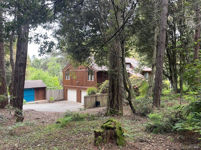 32691 Pearl Dr, Fort Bragg, CA 95437 - view of side of property featuring concrete driveway and an attached garage