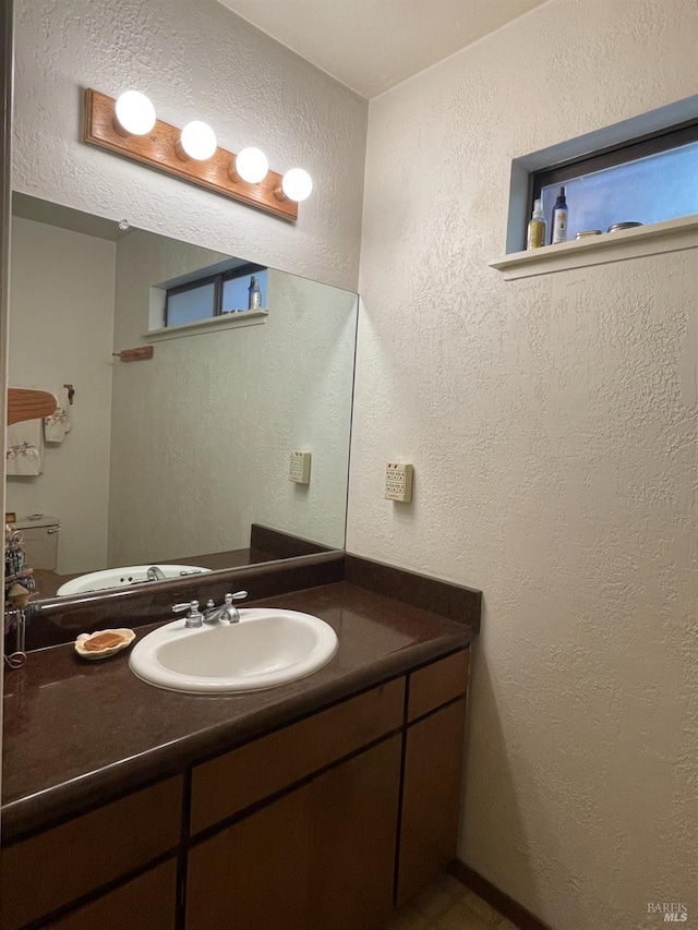 32691 Pearl Dr, Fort Bragg, CA 95437 - bathroom featuring a textured wall and vanity
