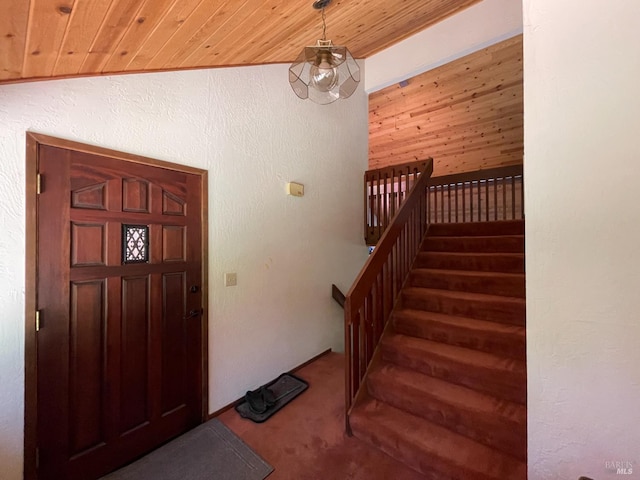 32691 Pearl Dr, Fort Bragg, CA 95437 - staircase featuring carpet floors and wooden ceiling