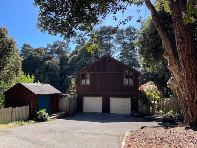 32691 Pearl Dr, Fort Bragg, CA 95437 - rustic home with driveway and an attached garage