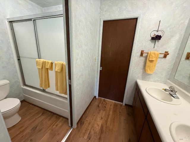 32691 Pearl Dr, Fort Bragg, CA 95437 - full bath featuring wood finished floors, double vanity, and shower / bath combination with glass door