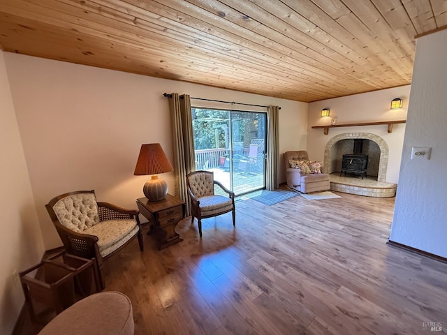 32691 Pearl Dr, Fort Bragg, CA 95437 - living room with wood finished floors, wood ceiling, and a wood stove