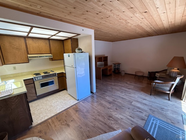 32691 Pearl Dr, Fort Bragg, CA 95437 - kitchen featuring white appliances, light countertops, exhaust hood, light wood finished floors, and wood ceiling