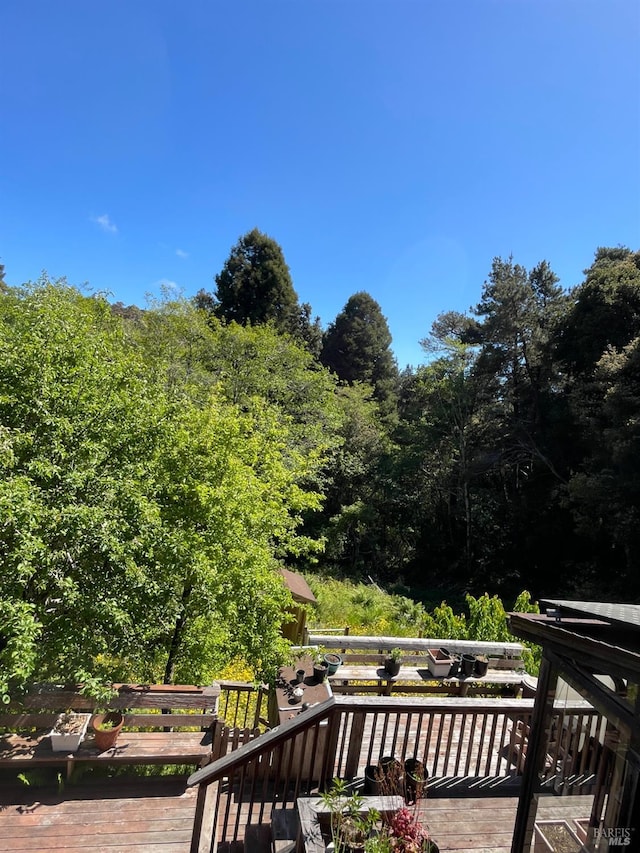 32691 Pearl Dr, Fort Bragg, CA 95437 - wooden deck featuring a wooded view