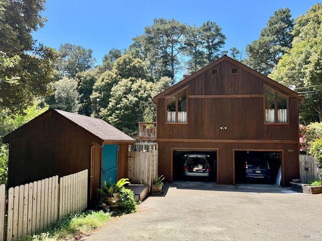 32691 Pearl Dr, Fort Bragg, CA 95437 - view of front of home with driveway and a shed