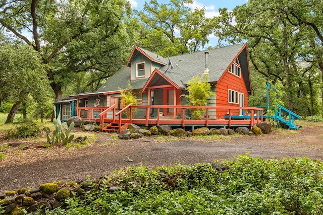 5338 Deception River Rd, Chico, CA 95928 - back of property featuring roof with shingles and a deck