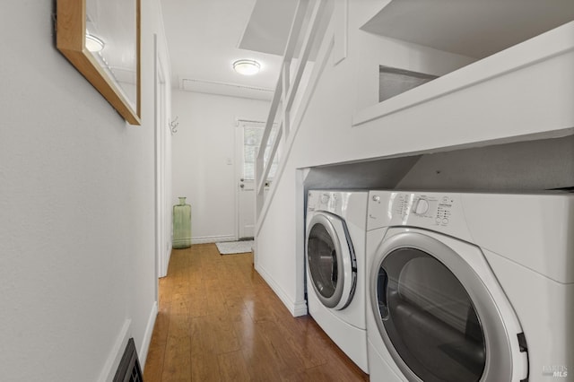 20 Selfridge St, Vallejo, CA 94590 - laundry area featuring washer and clothes dryer and wood finished floors
