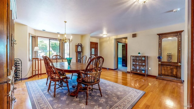 4389 Summit View Ranch Rd, Santa Rosa, CA 95404 - dining space with a chandelier and light wood finished floors