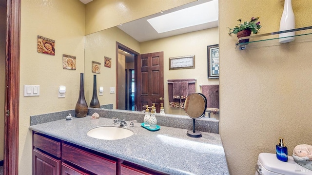 4389 Summit View Ranch Rd, Santa Rosa, CA 95404 - bathroom featuring a skylight, vanity, and a textured wall