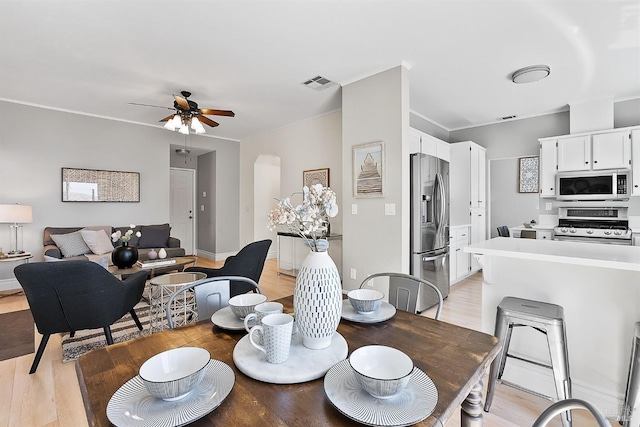 159 Suncliff Pl, Vallejo, CA 94591 - dining area with a ceiling fan, light wood finished floors, and ornamental molding