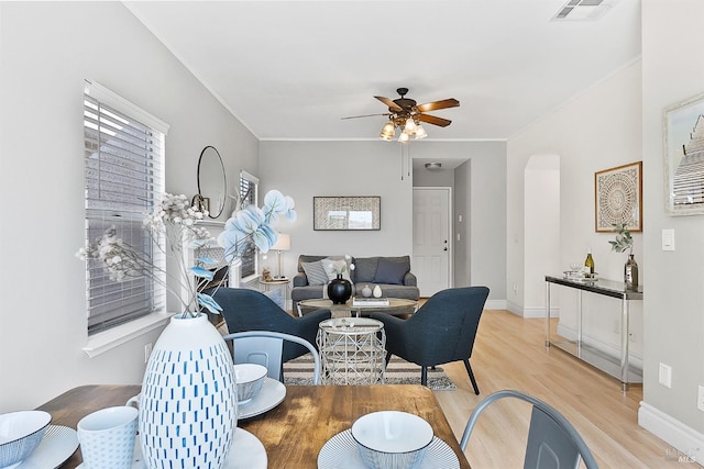 159 Suncliff Pl, Vallejo, CA 94591 - living area featuring a ceiling fan, wood finished floors, arched walkways, and ornamental molding
