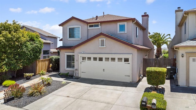 159 Suncliff Pl, Vallejo, CA 94591 - traditional home featuring stucco siding, a garage, concrete driveway, and a chimney