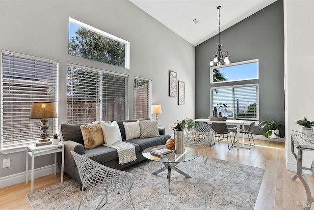 159 Suncliff Pl, Vallejo, CA 94591 - living room featuring high vaulted ceiling, wood finished floors, and a chandelier
