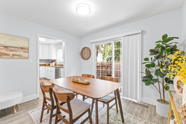 23 Ryan Ln, Cotati, CA 94931 - dining room with light wood-type flooring and baseboards