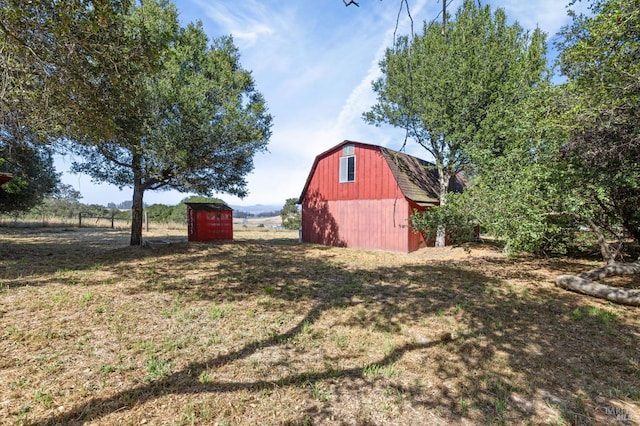 210 Valley View Dr, Petaluma, CA 94952 - view of yard with a barn, an outbuilding, and a garage