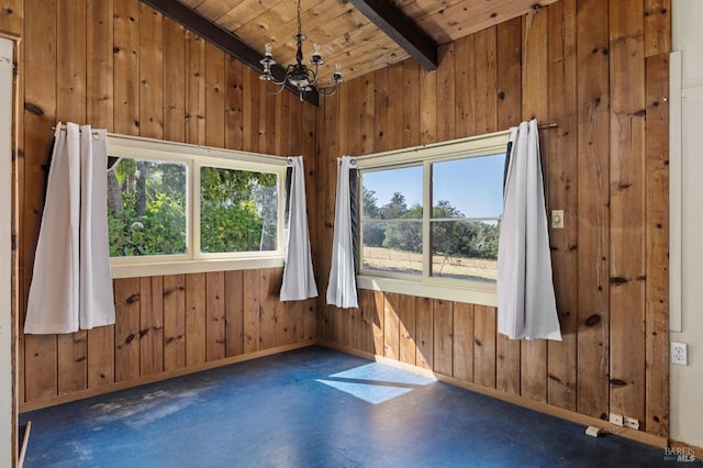 210 Valley View Dr, Petaluma, CA 94952 - spare room featuring healthy amount of natural light, wood walls, a wooden ceiling with exposed beams, and a chandelier