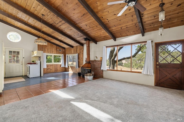 210 Valley View Dr, Petaluma, CA 94952 - unfurnished living room featuring a wood ceiling with exposed beams, plenty of natural light, tile patterned floors, high vaulted ceiling, and a wood stove